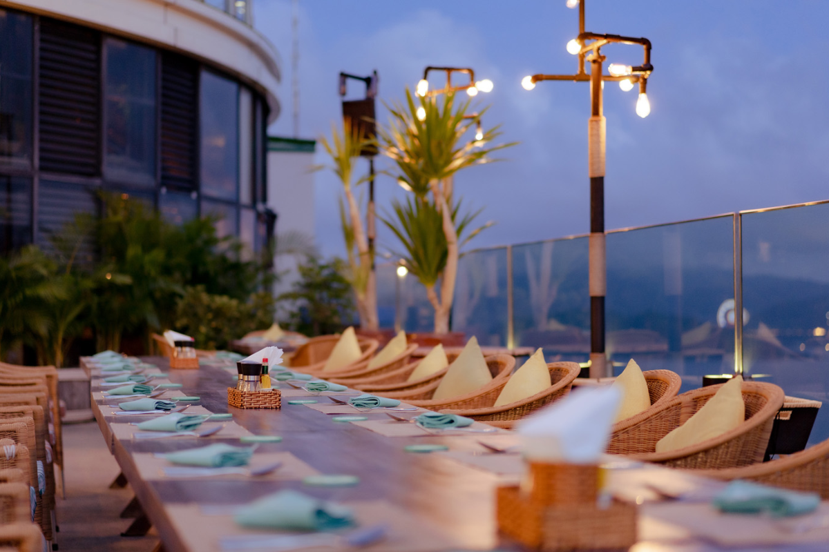 Night view from Skylight Rooftop Bar overlooking Nha Trang city and sea